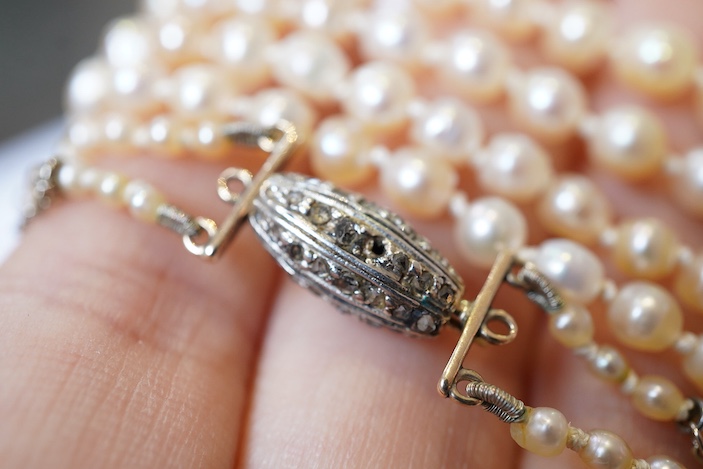 A natural pearl and diamond necklace, early 20th century